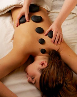 Masaje con Piedras Calientes